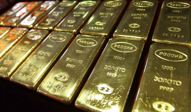 Зачем Россия увеличивает золотые запасы?